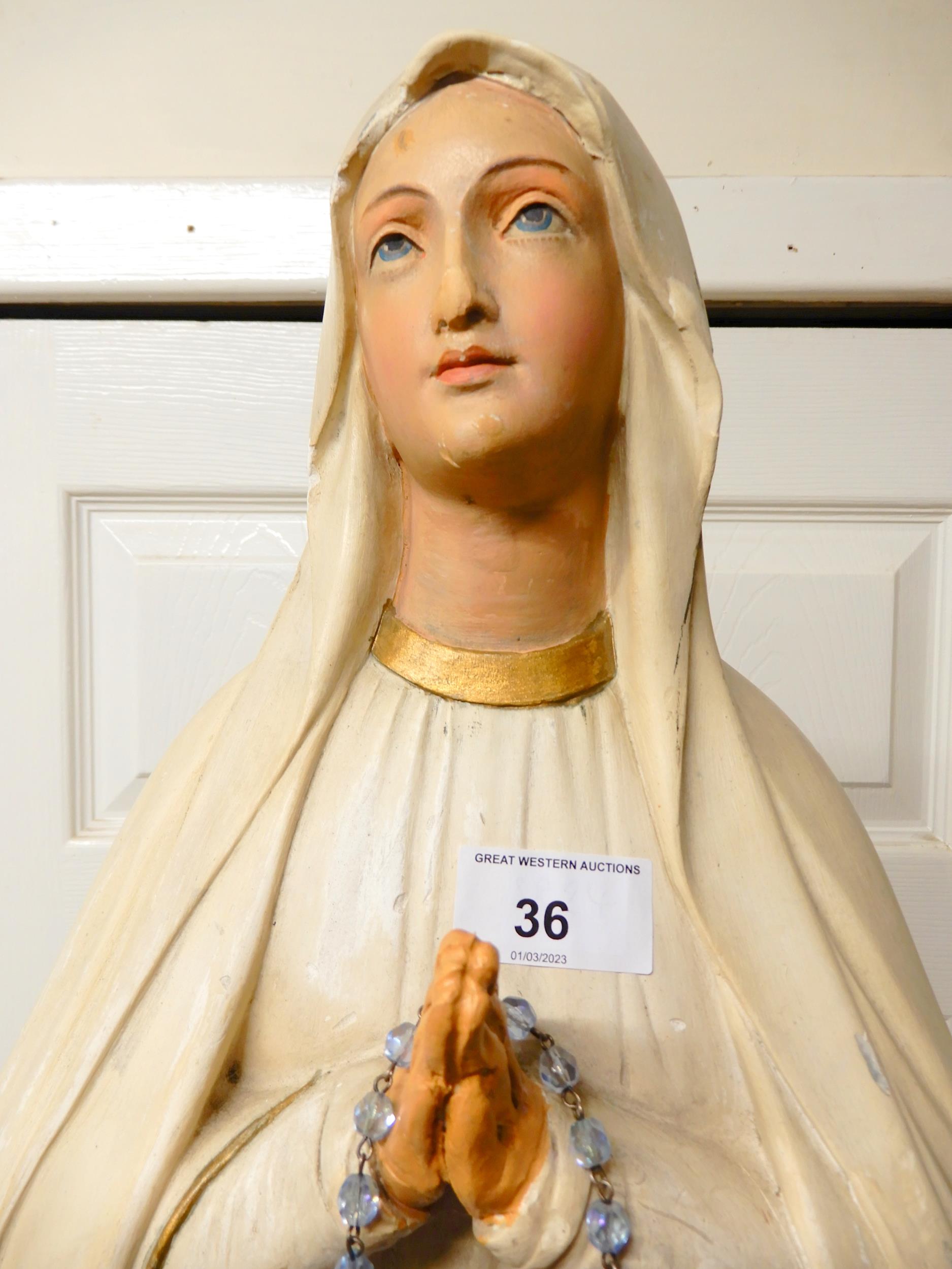 A 20th century ecclesiastical statue of Mary with hands clasped in prayer stood on a bed of roses, - Image 2 of 5
