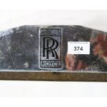 A chrome Rolls Royce radiator grille surround, measuring approx. 53.5cm high x 57cm wide overall
