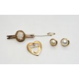 A 14k gold diamond set heart shaped brooch, weight 2.8gms, a yellow metal cameo brooch, and mabe