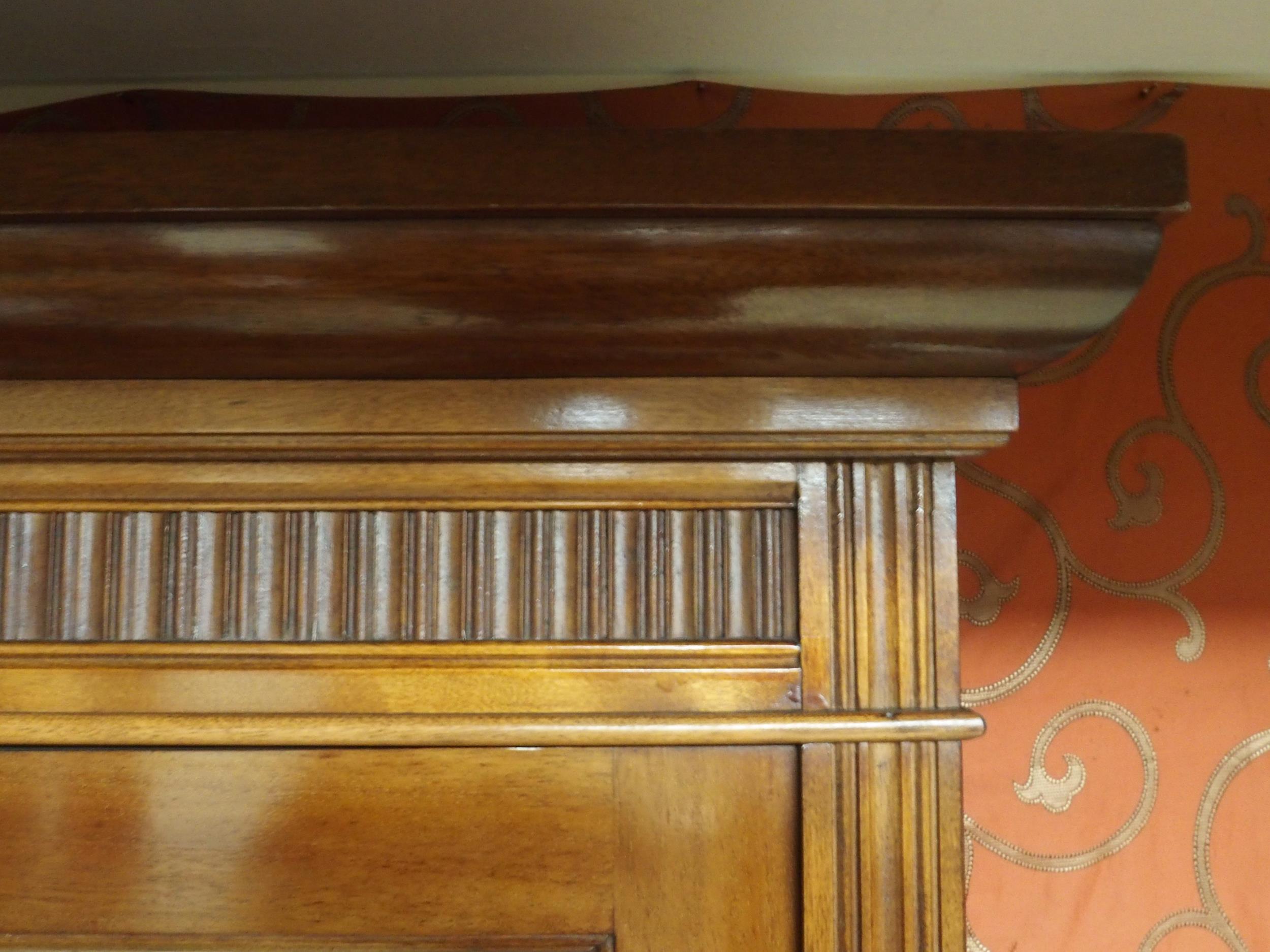 A Victorian mahogany bookcase on base with moulded cornice over pair of glazed doors over drawers - Image 4 of 5