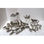 A collection of Dansk animals and a collection of silver plated animals Condition Report:some