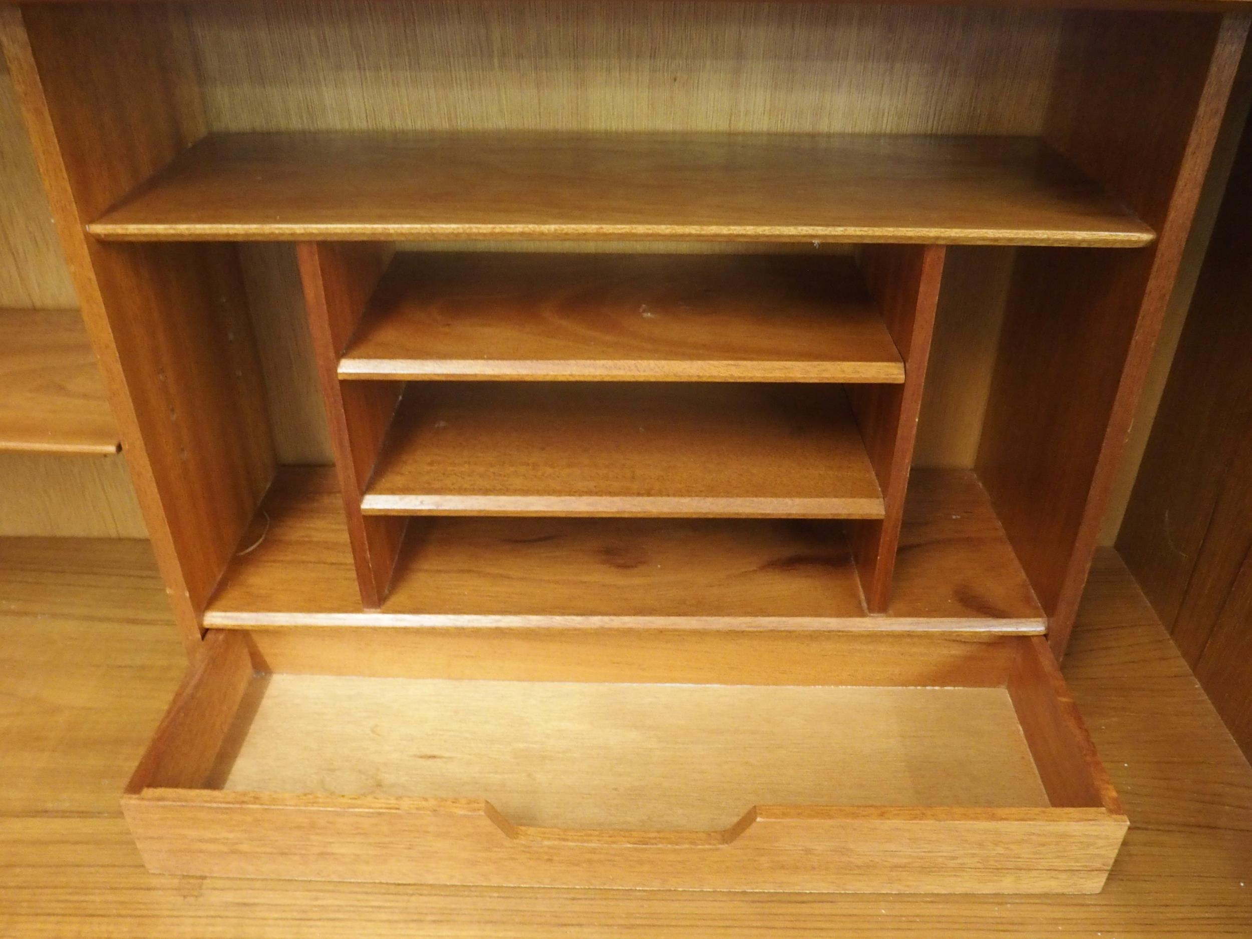 A mid 20th century teak writing bureau with fitted fall front writing compartment over two drawers - Image 3 of 5