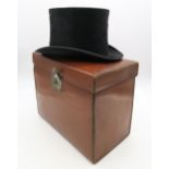 A silk top hat, generous size, by R.W. Forsyth, Glasgow, contained in a tan leather velvet-lined