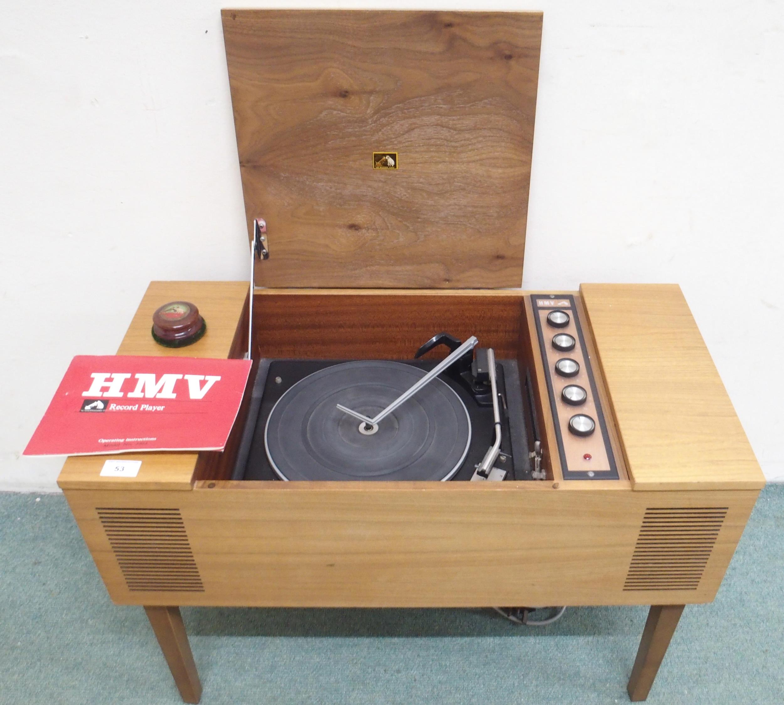 A mid 20th century teak cased HMV record stereo with Garrard 2025TC turntable, 51cm high x 74cm wide