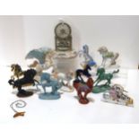 A collection of unicorn figures including Franklin Mint and a merry go round clock Condition