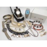 A ladies Gucci watch, serial number 0311410, movement number 901001, together with other watches