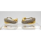 A pair of 18ct gold Italian made, diamond pave set, creole earrings weight 9.5gms Condition Report: