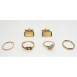A pair of 9ct gold cufflinks, and four 9ct gold rings (two wedding rings sizes J and M1/2, Gem