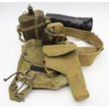 A collection of WW2-era webbing etc., comprising belt fitted with holster (dated 1942), ammo pound