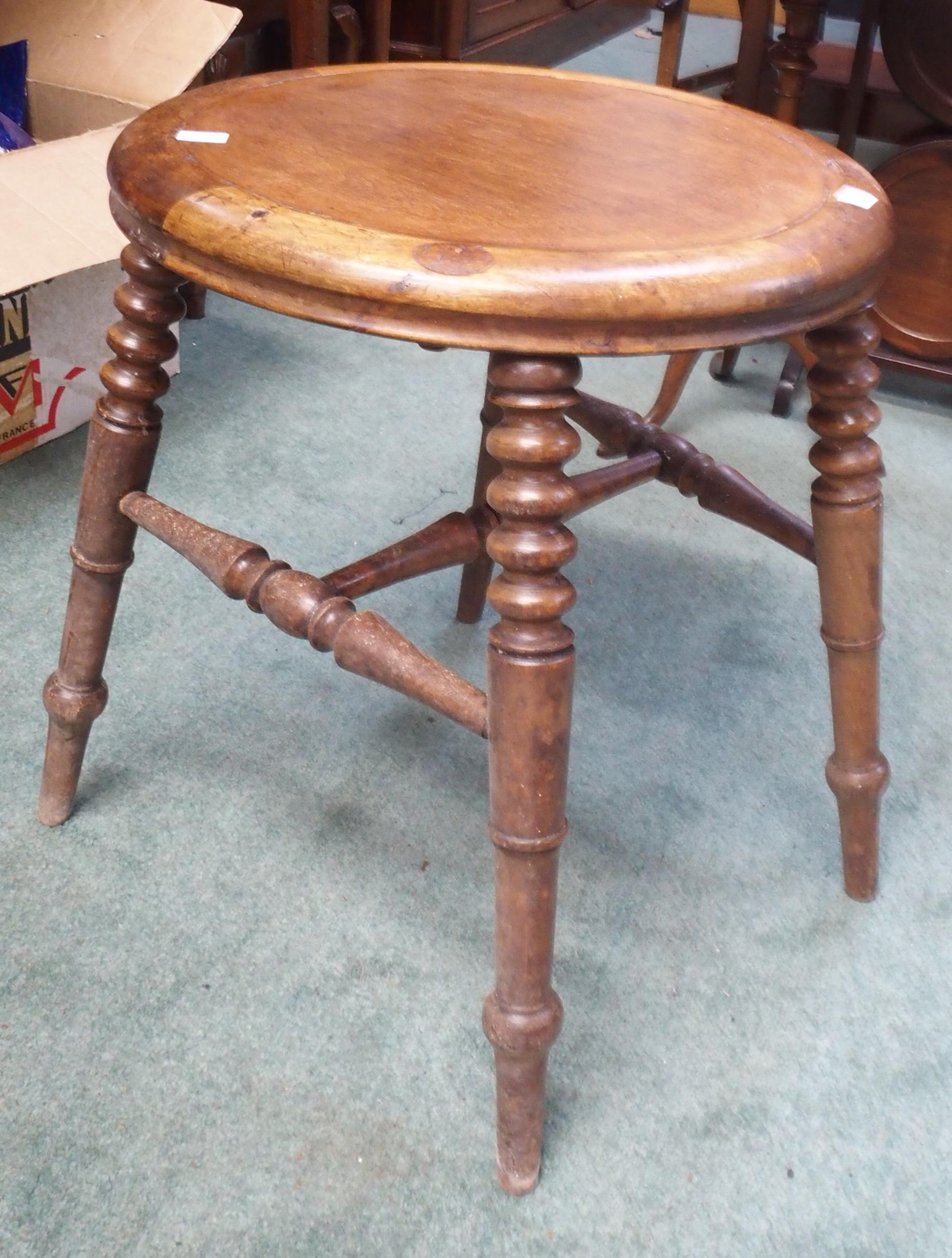 A Victorian circular stool on turned stretchered supports, mahogany trolley, three tier folding cake - Image 2 of 5