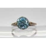 A blue zircon set ring, mounted in white metal size O, weight 1.9gms Condition Report:Available upon