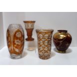 Three amber flashed and cut glass vases together with a ruby and gilt vase Condition Report: