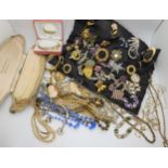 A large collection of vintage brooches, beads, necklaces etc Condition Report:No condition report