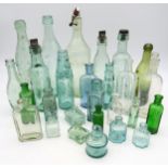 A collection of glass druggist's and soft drinks bottles, to include Aberdeen, Glasgow,