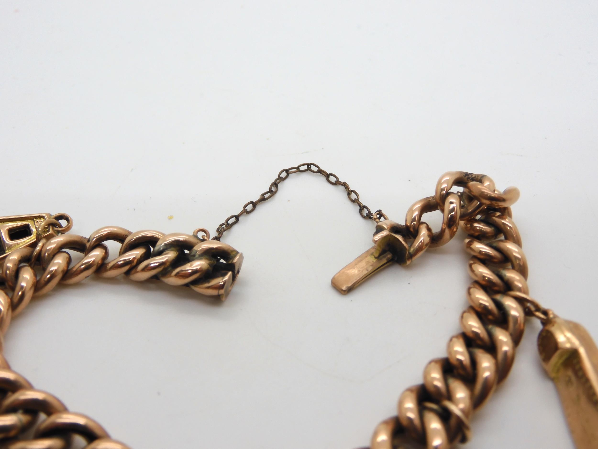 A rose coloured metal curb chain bracelet hung with four 9ct gold hollow charms, weight all together - Image 2 of 6