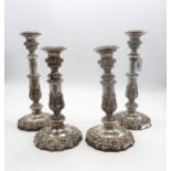 A set of four Victorian silver plated telescopic candlesticks, of cylindrical form, the capstan stem
