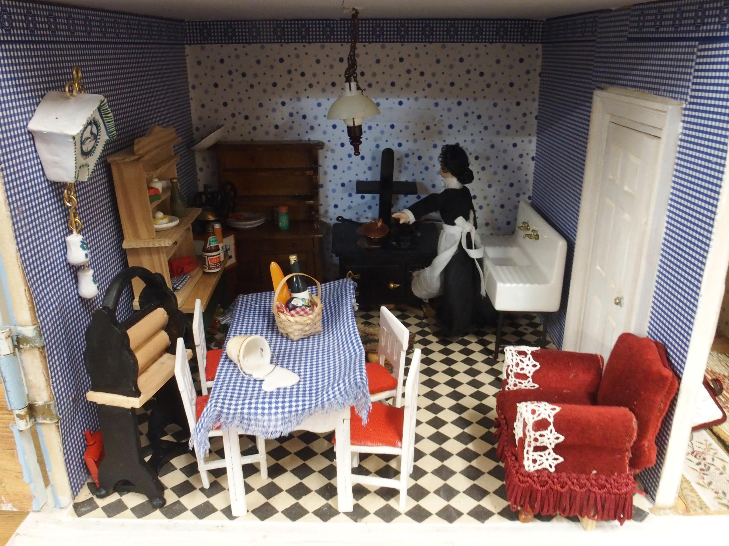 A 20th century three storey dolls house with assorted furniture and figures etc, 84cm high x 80cm - Image 10 of 13