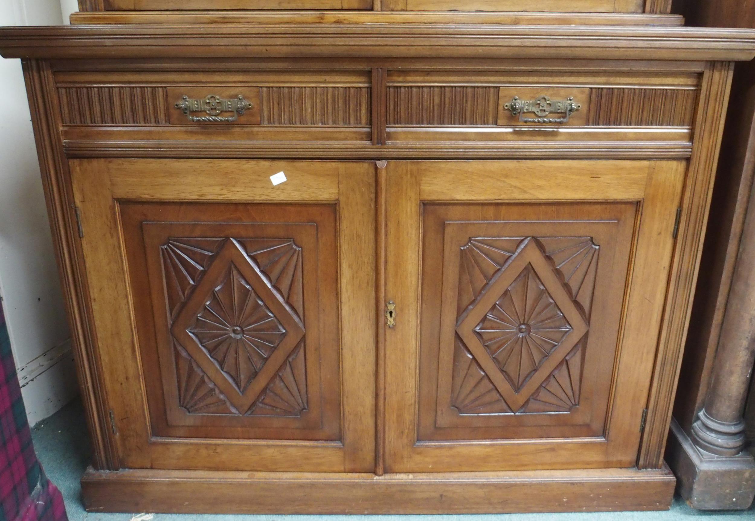 A Victorian mahogany bookcase on base with moulded cornice over pair of glazed doors over drawers - Image 2 of 5