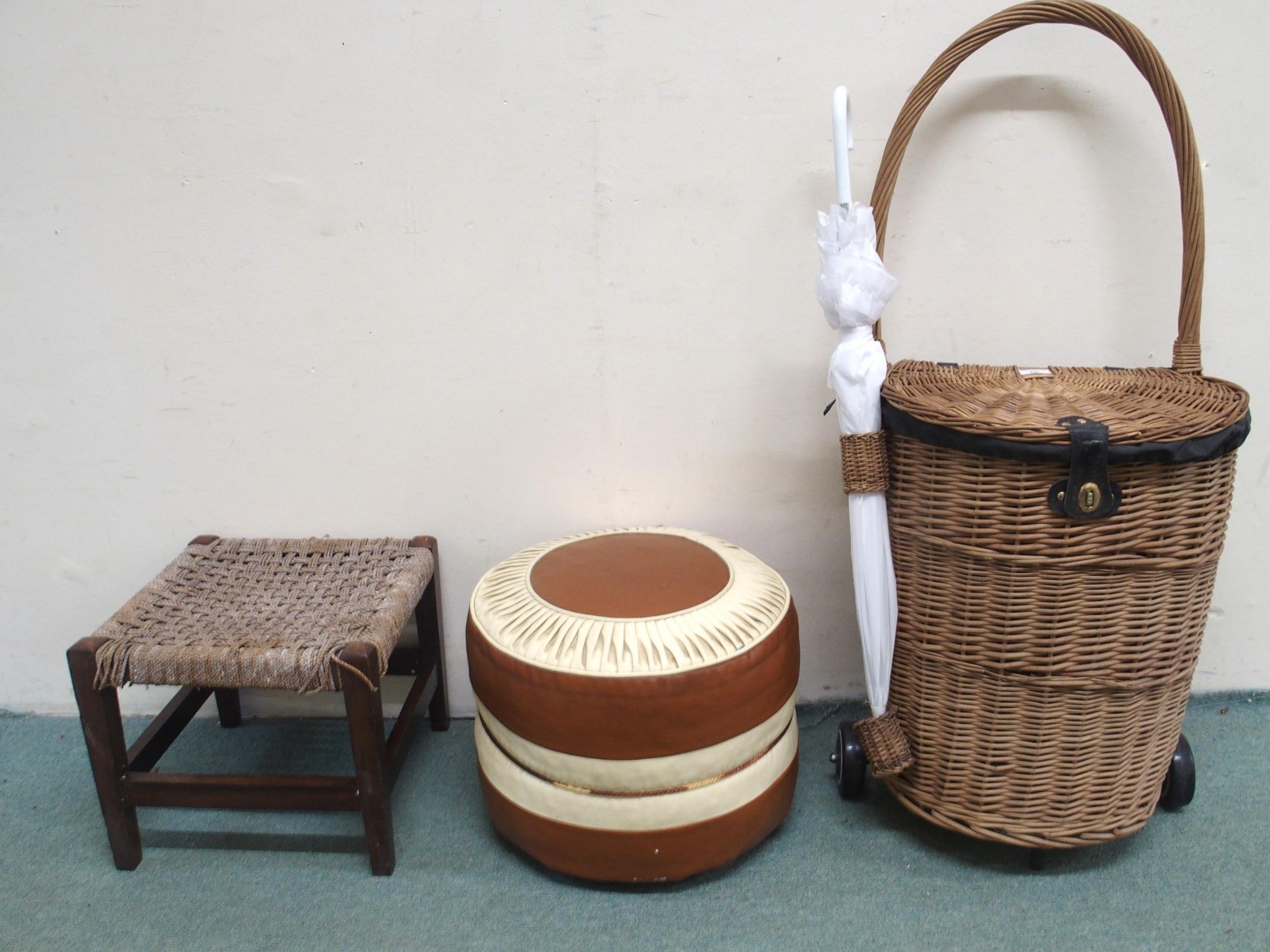 A 20th century basket woven shopping trolley, leather upholstered poof and a strung footstool (3)