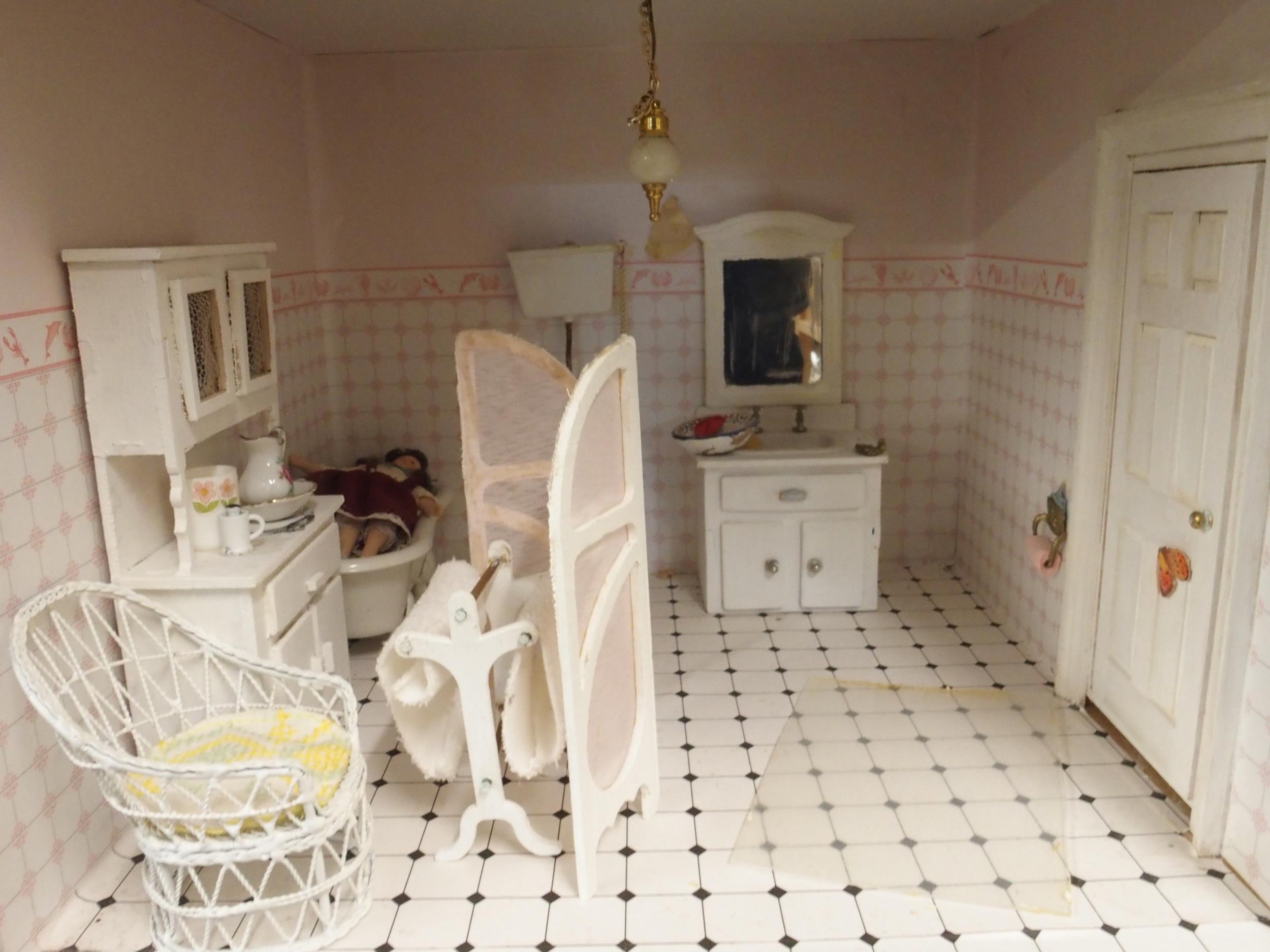 A 20th century three storey dolls house with assorted furniture and figures etc, 84cm high x 80cm - Image 7 of 13