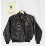 A Planet Hollywood leather bomber jacket (size M), autographed by David and Victoria Beckham, with