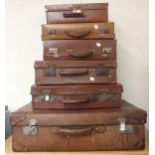 A lot of six assorted late 19th/early 20th century leather travel cases (6) Condition Report: