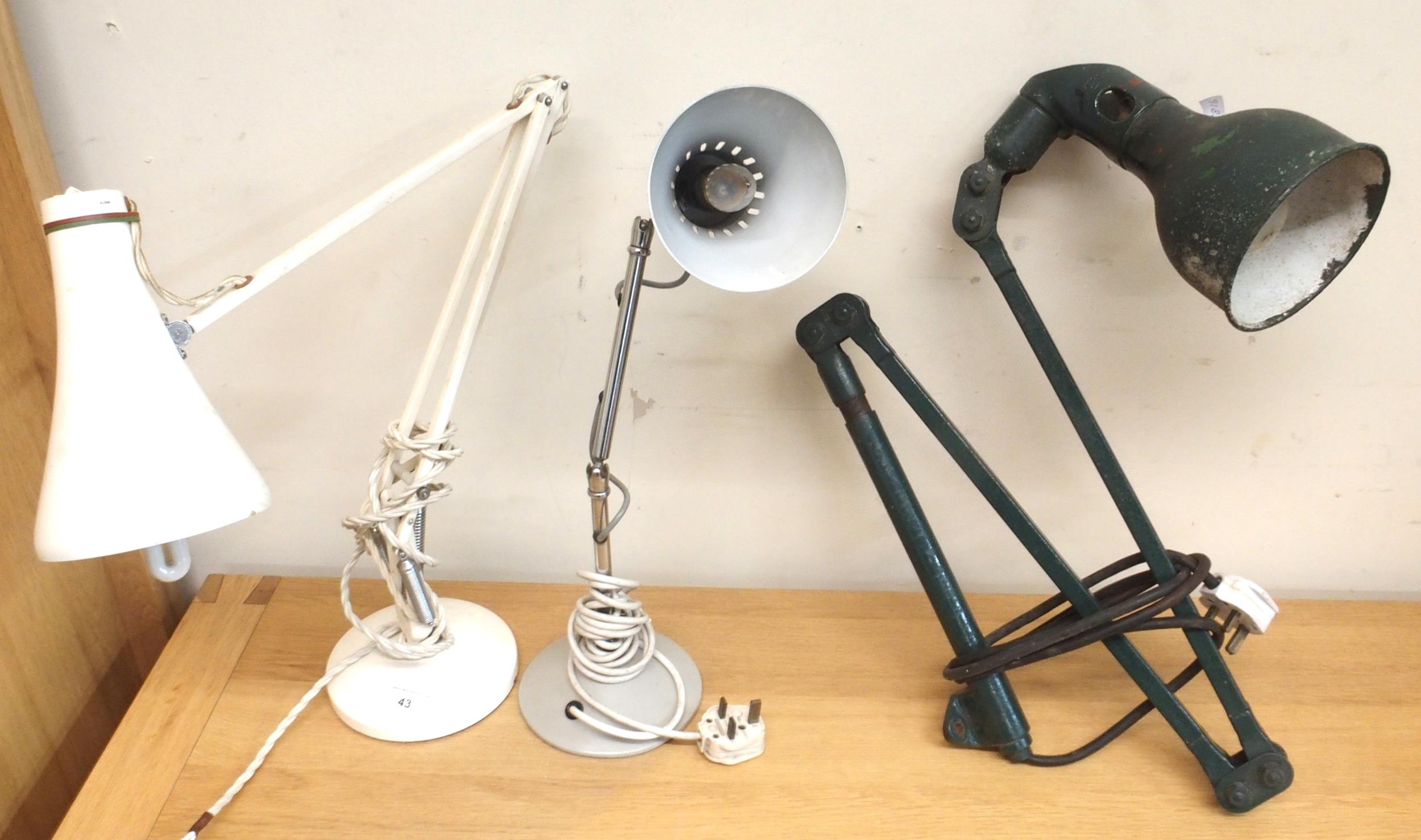 A mid 20th century "Anglepoise" desk lamp, a smaller adjustable desk lamp and a wall mounted
