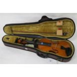 A two piece back violin by Stentor Romania with a bow and case, strings etc Condition Report: