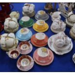 A Royal Moss Rose pattern teaset, a Crown China teaset, a harlequin set of trio's with internal rose