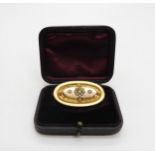 A 15ct gold pearl set locket back brooch, 4cm  x 2.2cm, weight 9.3gms Condition Report:Available