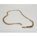 A twisted 9ct gold ribbon chain necklace, length 41cm, weight 7.6gms Condition Report:Available upon