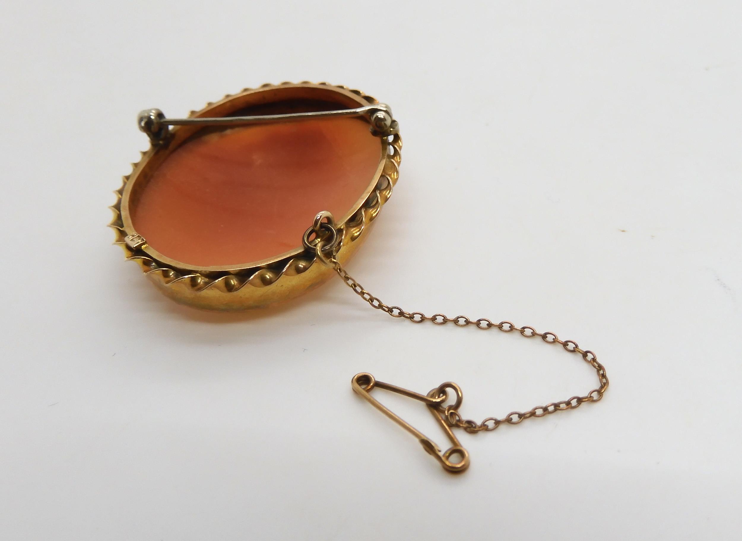 A 9ct gold mounted cameo brooch, a yellow metal opal brooch and a 9ct red gem brooch, weight - Image 2 of 6