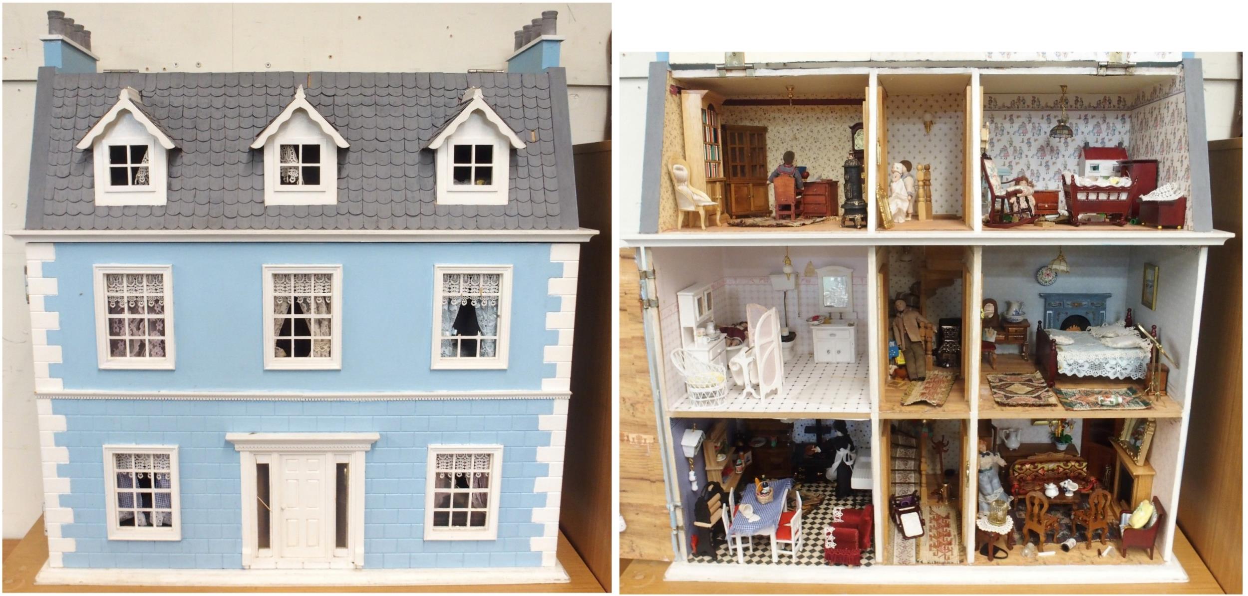 A 20th century three storey dolls house with assorted furniture and figures etc, 84cm high x 80cm