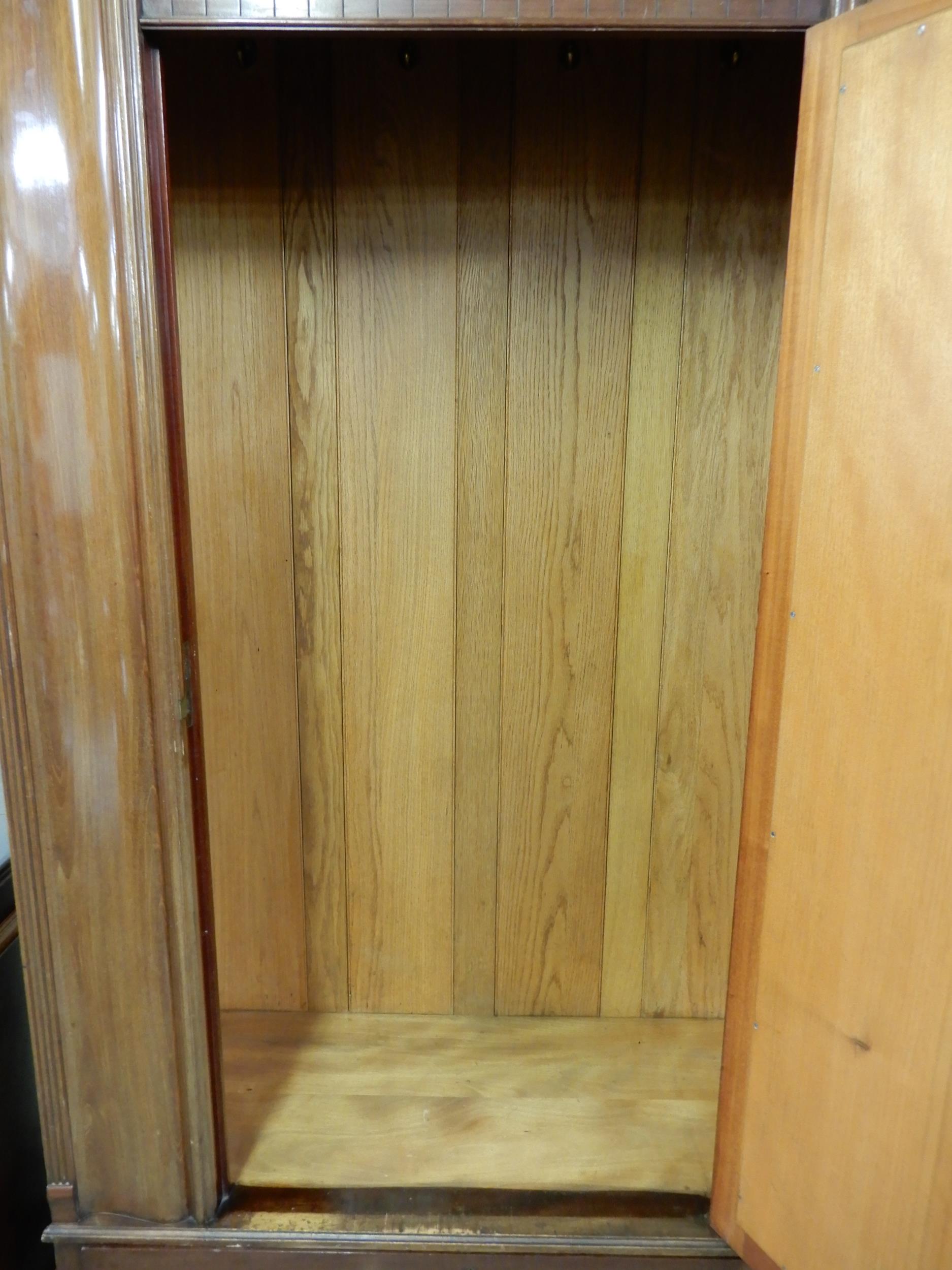 A late Victorian mahogany wardrobe with moulded cornice over single mirrored door over single drawer - Image 6 of 7