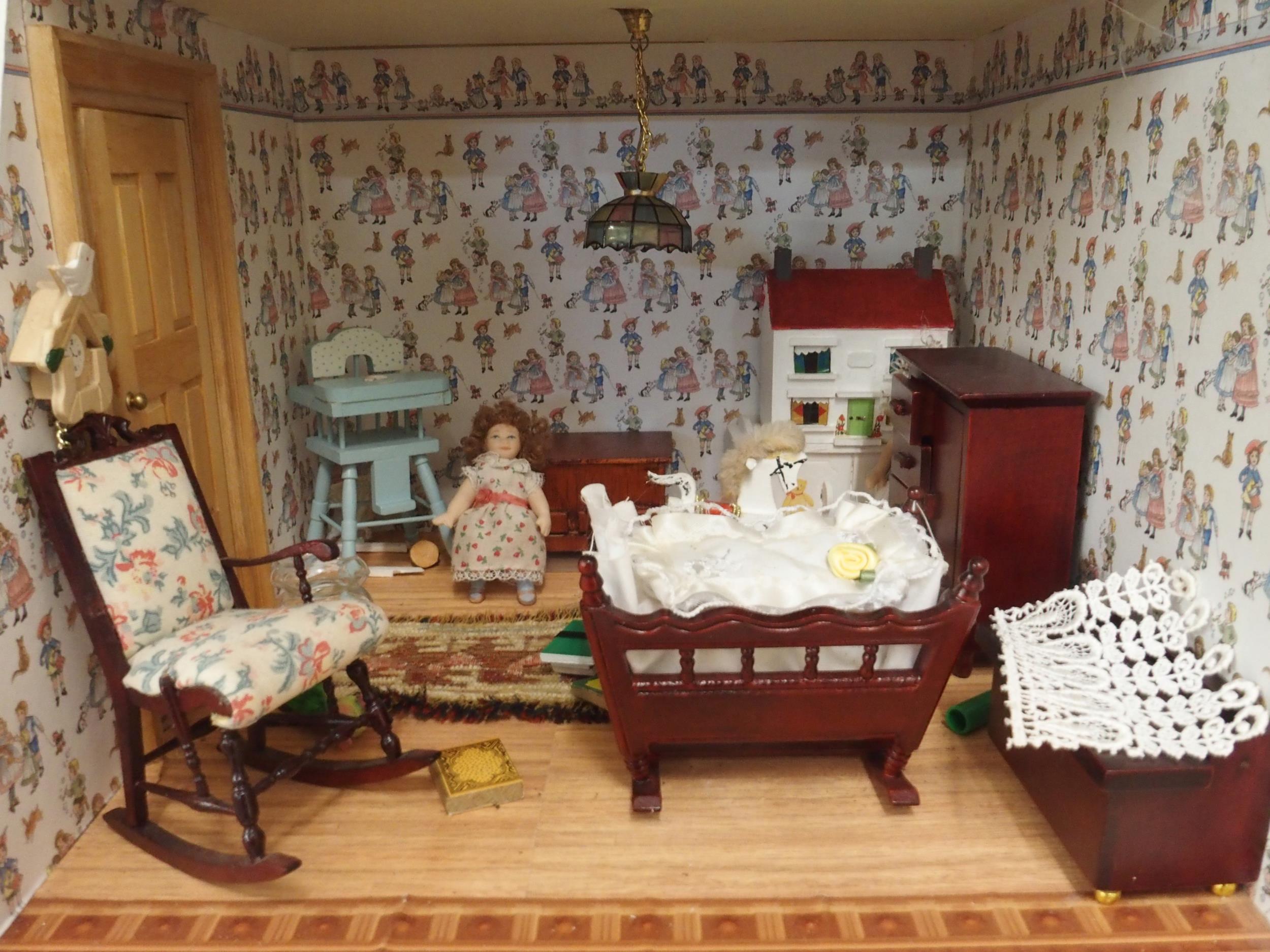 A 20th century three storey dolls house with assorted furniture and figures etc, 84cm high x 80cm - Image 6 of 13