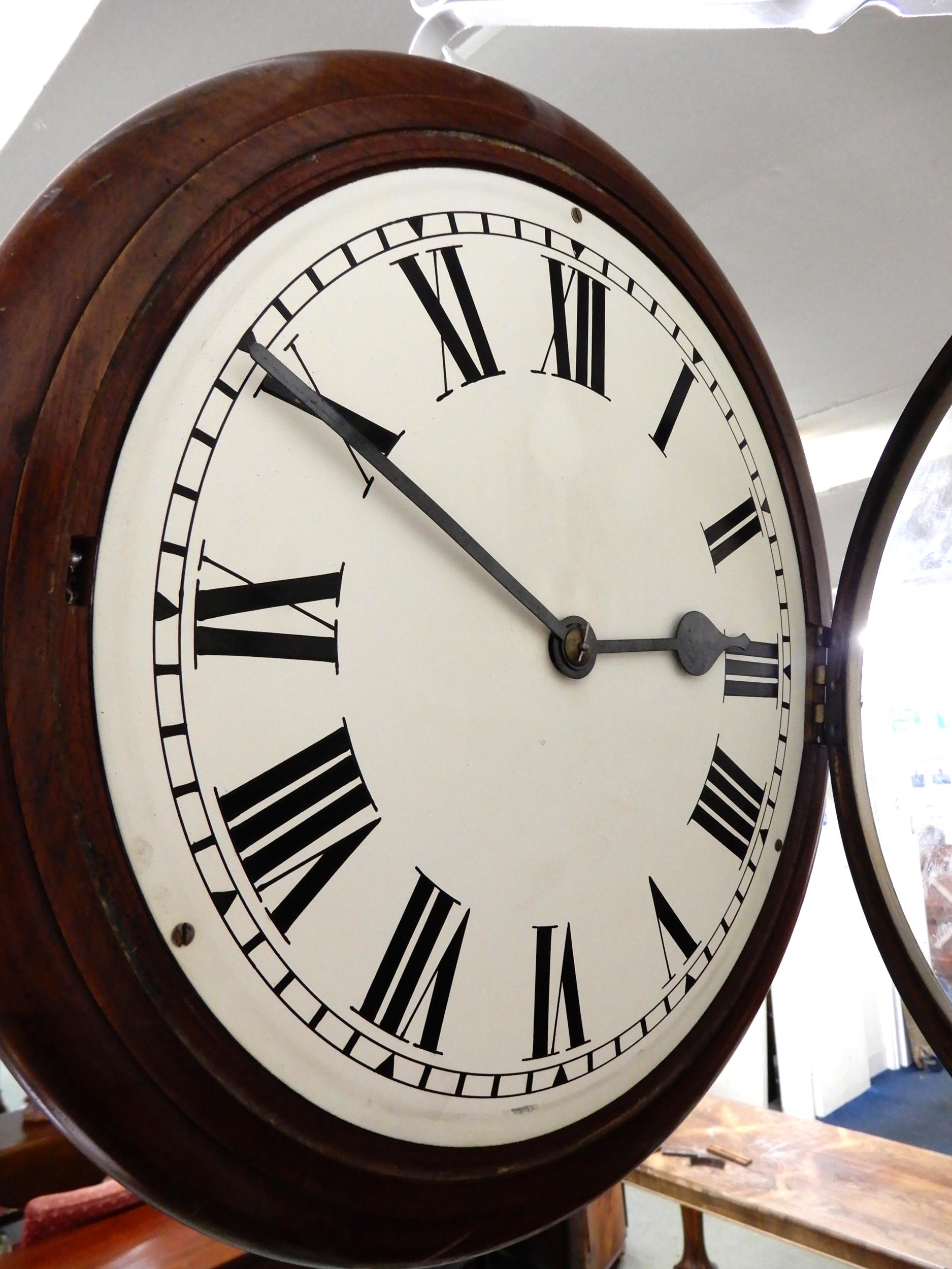 An early 20th century mahogany cased double sided station style clock with both exhibiting white - Image 6 of 6