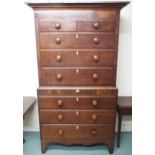 A Victorian mahogany chest on chest with moulded cornice over two short over three long drawers on