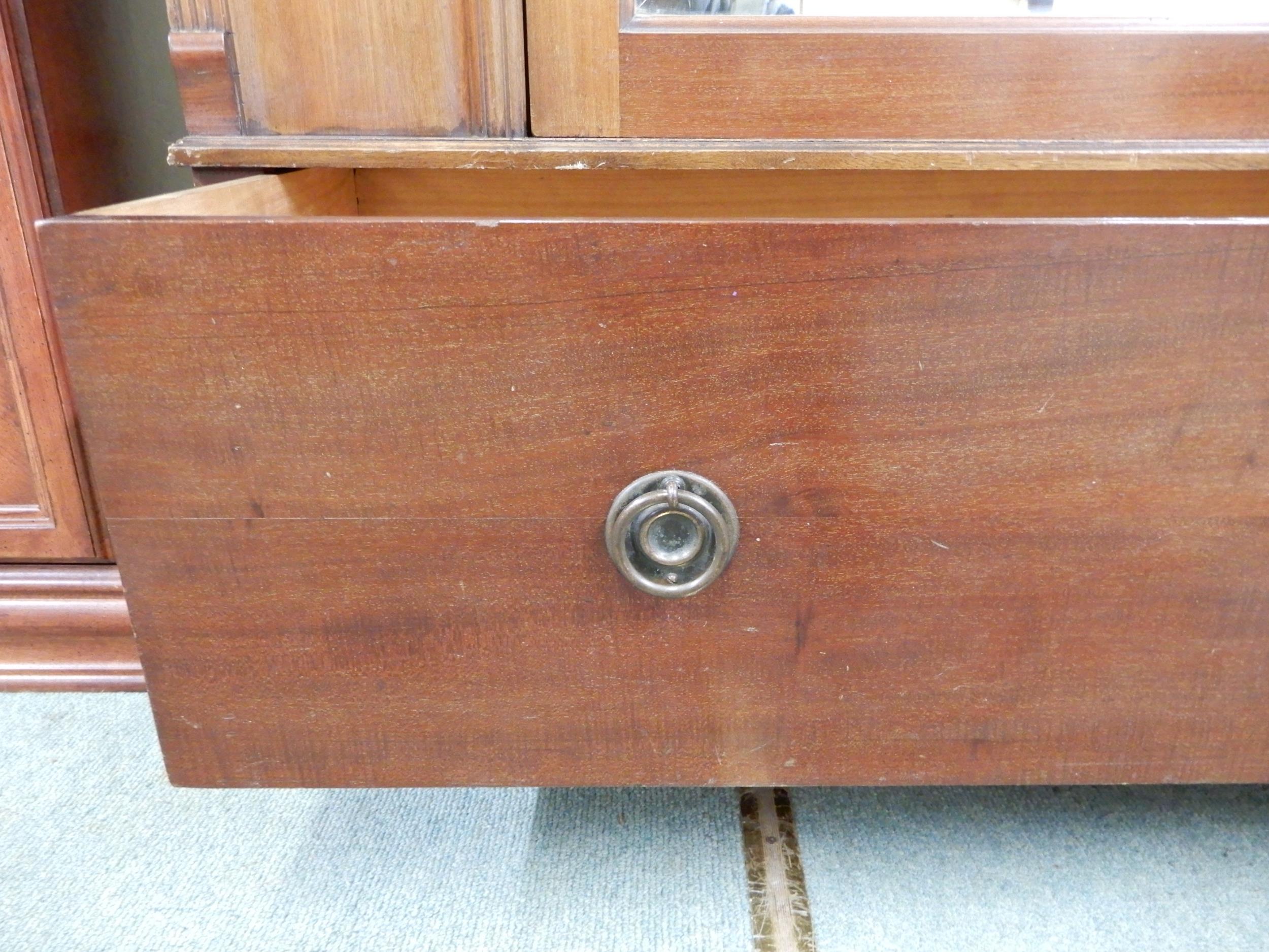 A late Victorian mahogany wardrobe with moulded cornice over single mirrored door over single drawer - Image 3 of 7