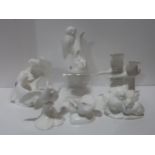 A collection of white glazed Royal Doulton Images sculptures including Going Home, Night Watch,