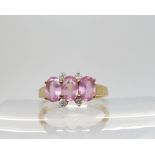 A Gems Tv 9ct gold pink sapphire and diamond ring, finger size N1/2, weight 2gms Condition Report: