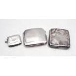 A silver cigarette case, by Charles Cooke, Chester 1923, another by Henry Matthews, Birmingham,