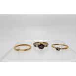 An 18ct gold wedding ring size O1/2, a further 18ct ring shank, weight together 4gms, together