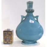 A Royal Worcester vase of Eastern shape with reticulated neck and two handles, and a Italian faience
