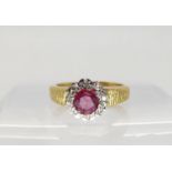 An 18ct gold synthetic ruby and diamond retro ring, size M1/2, weight 5gms Condition Report: