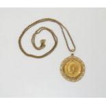 A 1911 gold full sovereign on a 9ct gold pendant mount with a 56cm long 9ct box chain, weight
