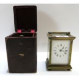 A French brass and glass carriage clock with travelling case Condition Report:Available upon