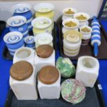 A collection of kitchen storage jars including T G Green Cornish ware in blue and yellow banding,