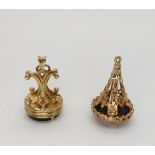 Two 9ct gold decorative fob seal pendants, one with a Centurion carved onyx, the other with a