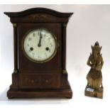 A wooden Balinese figure of a dancer and a inlaid mantle clock Condition Report:Available upon