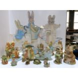 A collection of Beatrix Potter figures mainly Border Fine Arts, together with three advertising